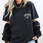 Person wearing a black t-shirt with 'COOLMOM'S' text on a white background