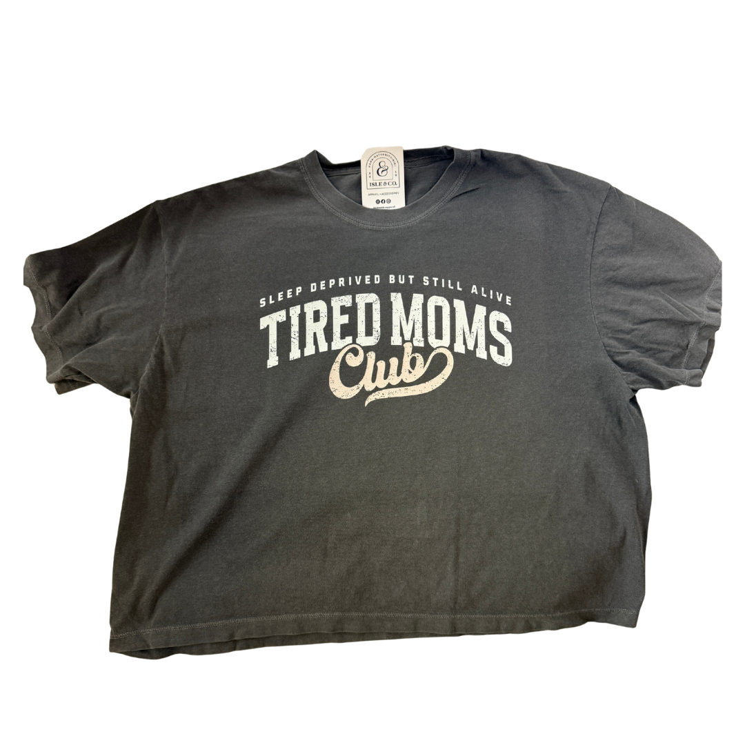 Gray t-shirt with 'Tired Moms Club' text on a white background